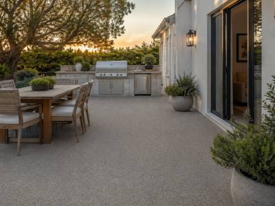 Outdoor dining patio finished in rubber surfacing